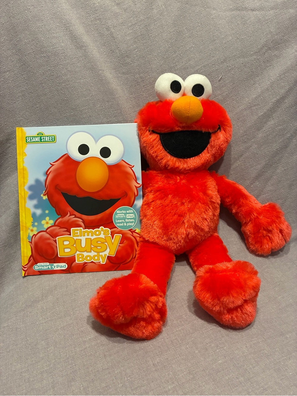 Sesame Street Elmo Plush Toy - Bright Red  Buddy and book.